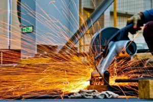 Image of a person welding stainless steel